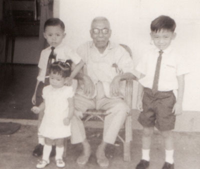 Lina with brother Raymond, cousin Kenny and grandfather