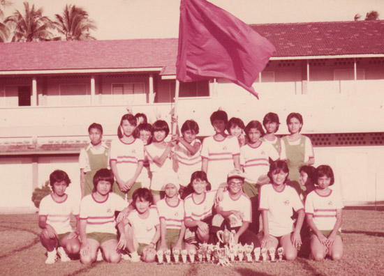 Lina, front row, fourth from right (in glasses), captain of her school sports team in Form Four, 1984
