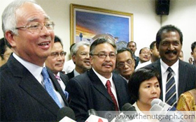 Osman (red tie), Jamaluddin (striped tie)