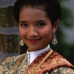 Young woman in traditional Baba Nyonya costume.