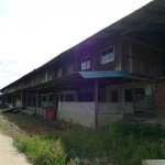 Longhouse in Long Teran Kanan. At the end of the road is the entrance to a kindergarten and primary school.