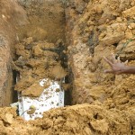 Family members throwing earth onto a casket before they leave the burial site, as featured in 'A Given Path'. (Pic by Nafise Motlaq)
