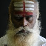 A Hindu priest prays silently. A pottu, which covers the spot between the eyebrows, is recognised as a religious mark. (Pic by Nafise Motlaq)
