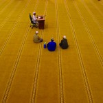 An imam from the Kampung Baru mosque preparing his message before the congregation arrives. (Pic by Nafise Motlaq)