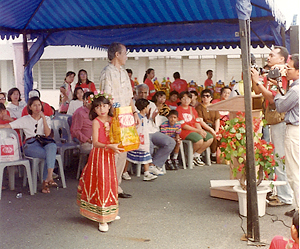 Yuna winning a competition at her school