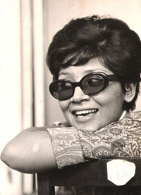 FM-young,-short-hair-w-sunglass A younger Faridah sporting a short hairdo