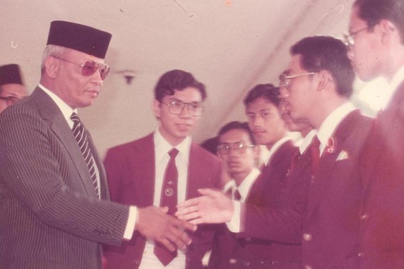 As the headboy of MCKK introducing prefects to HRH The King on Speech Day in 1980.